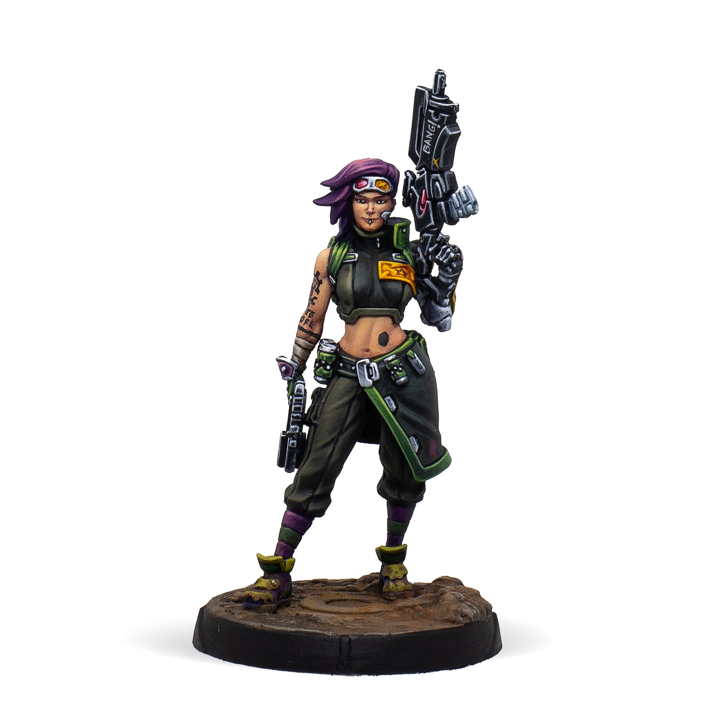 Figurine of a character in futuristic attire with weapons on a white background