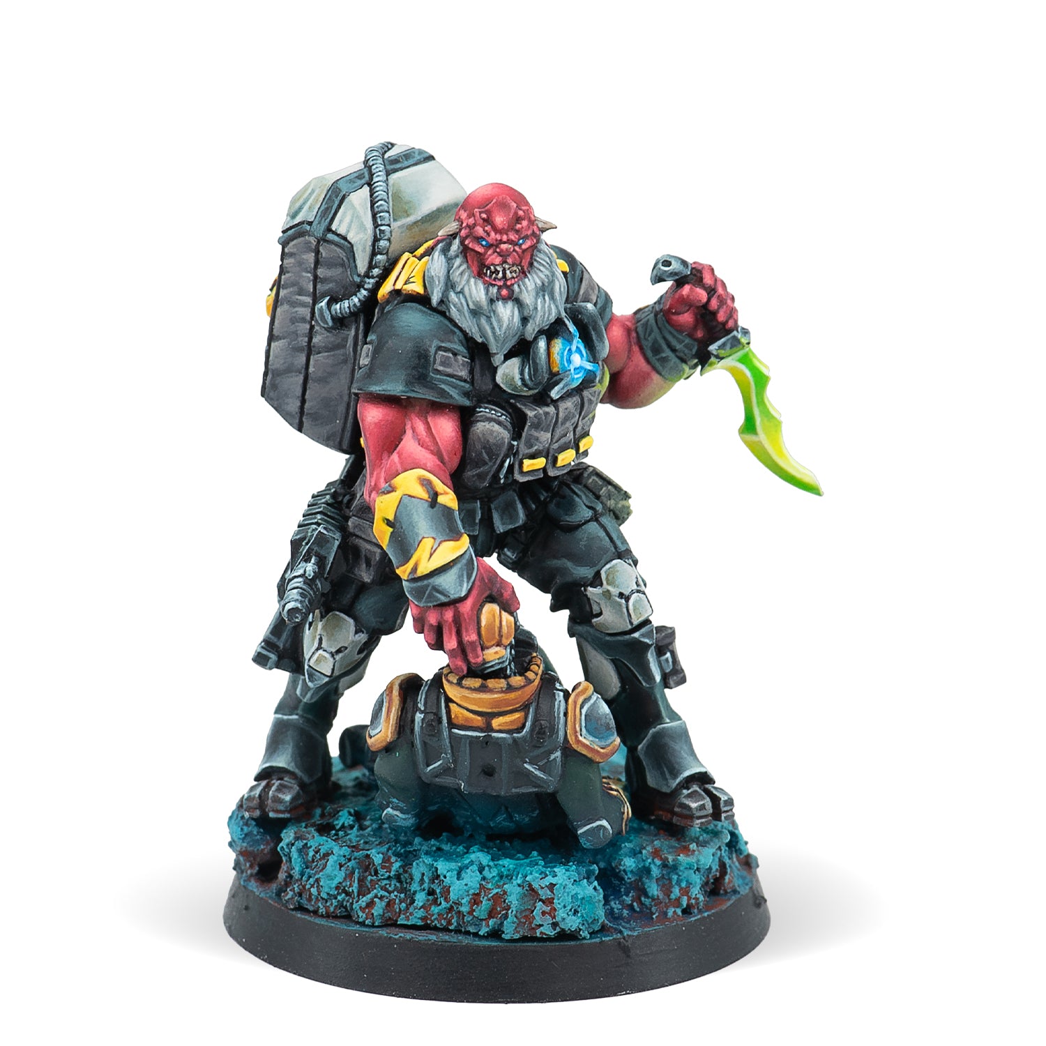 A miniature figure of a Krakot Renegade equipped with two submachine guns and a chest mine, standing on a base with blue terrain effects.