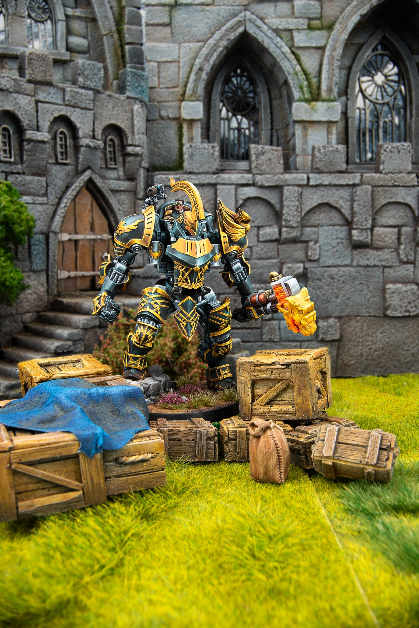 Fantasy figure in armor with a sword in front of a stone castle.