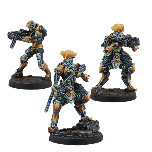 Three detailed figurines with futuristic armor and weapons on a white background