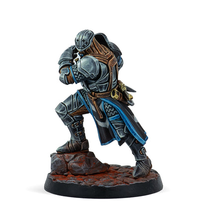 Fantasy figurine of a armored warrior on a white background