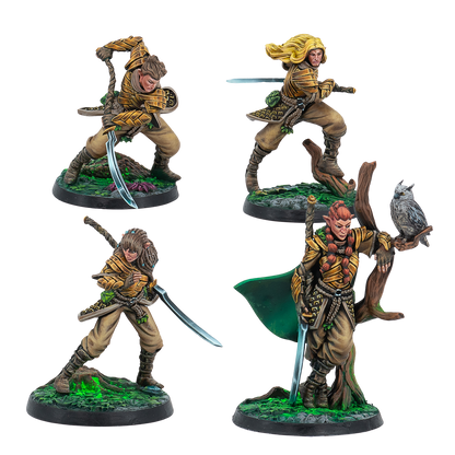Four fantasy figurines on a white background