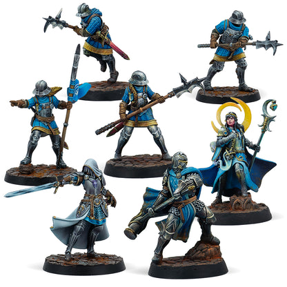 Collection of detailed miniature figurines on stands against a white background